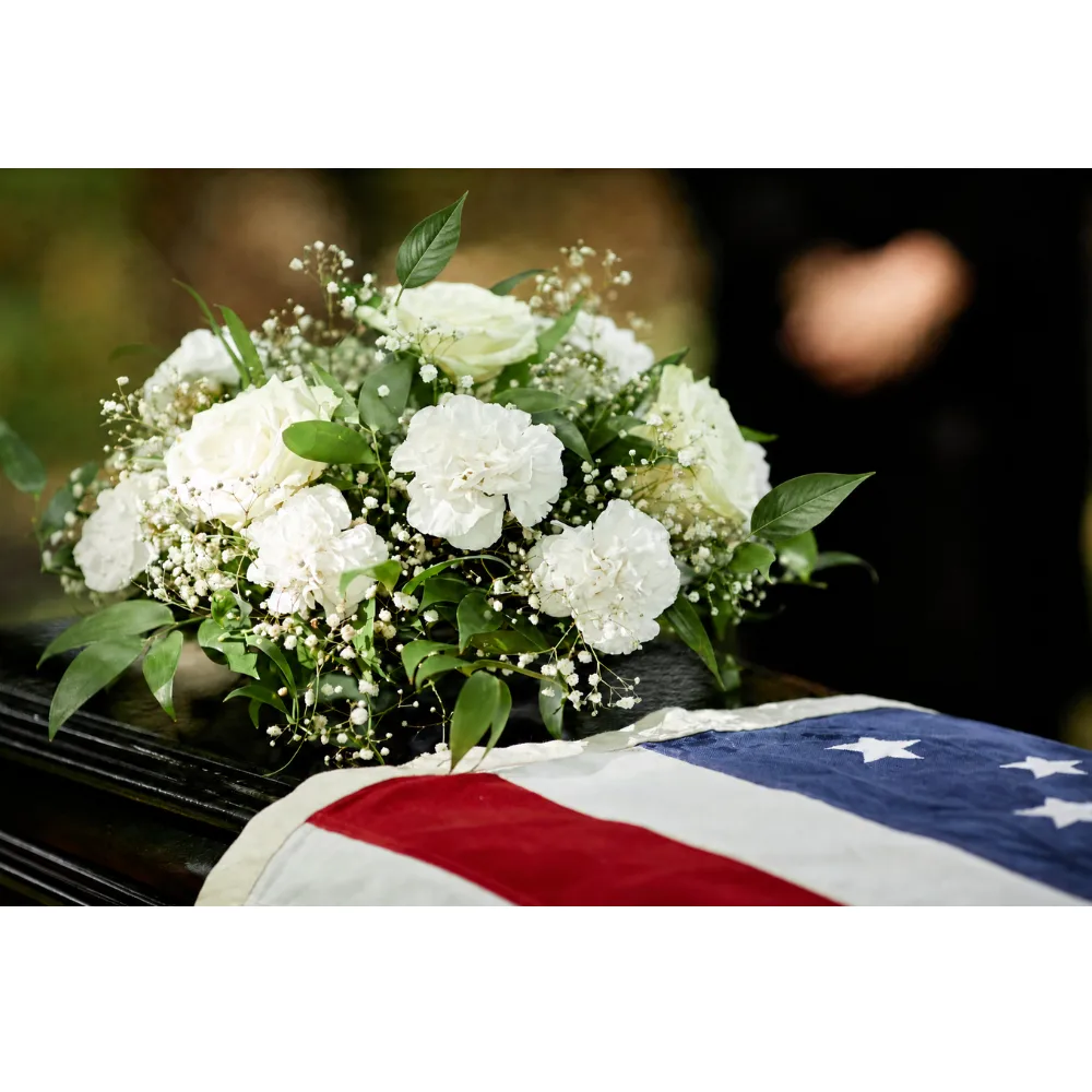flag folding at a military funeral