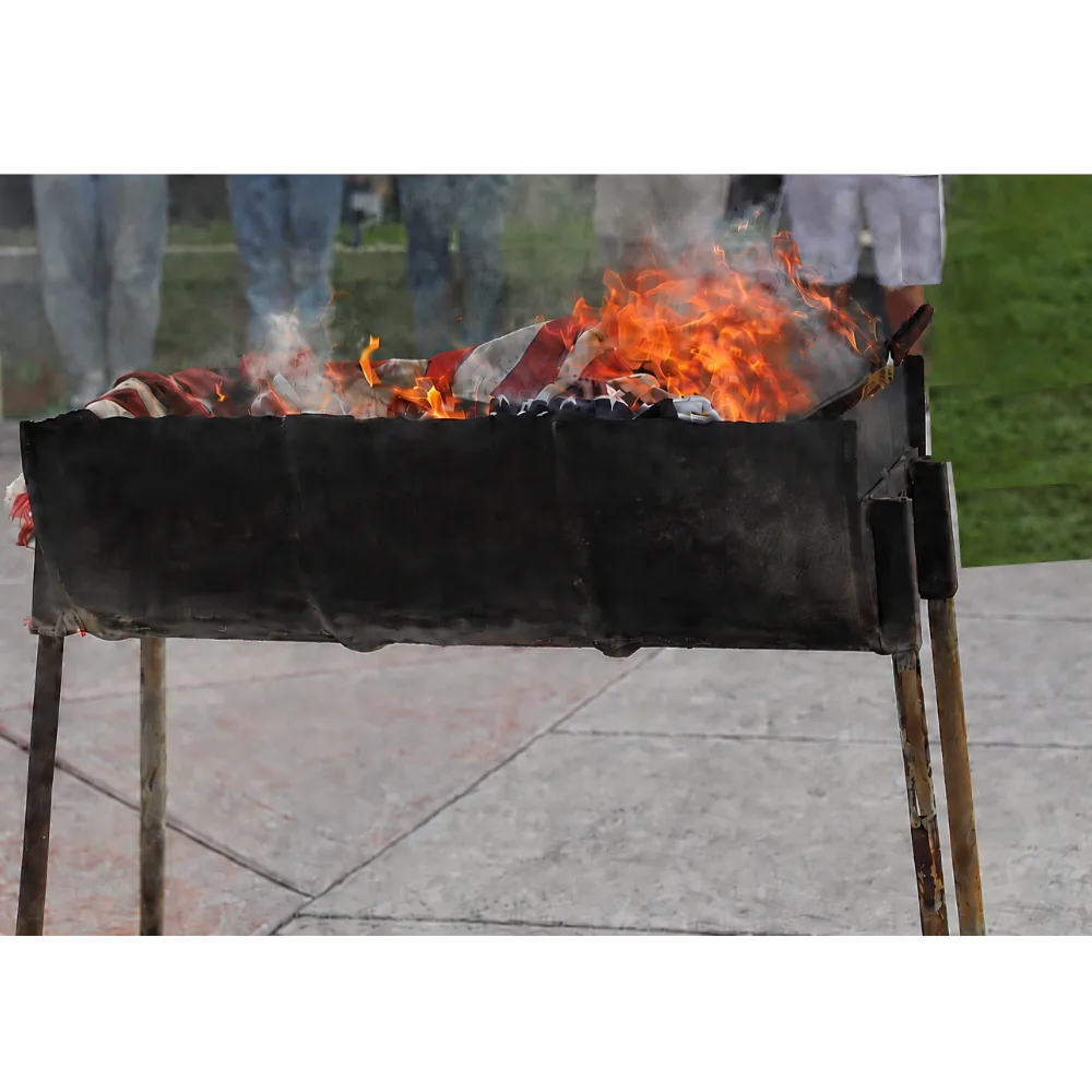 Student delegates watching an American flag retirement ceremony at Freedom Academy 2026, Camp Williams, Utah