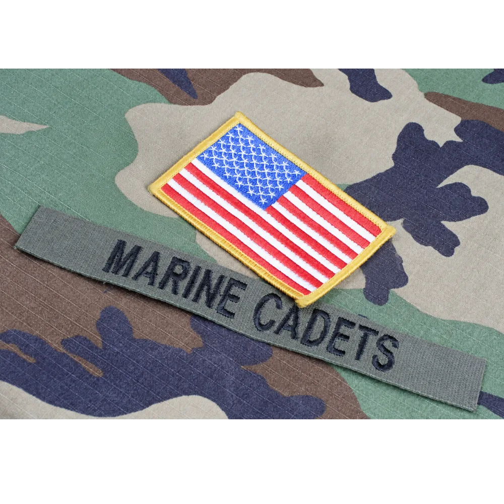 A U.S. flag patch layed on top of a Marine cadet's shirt